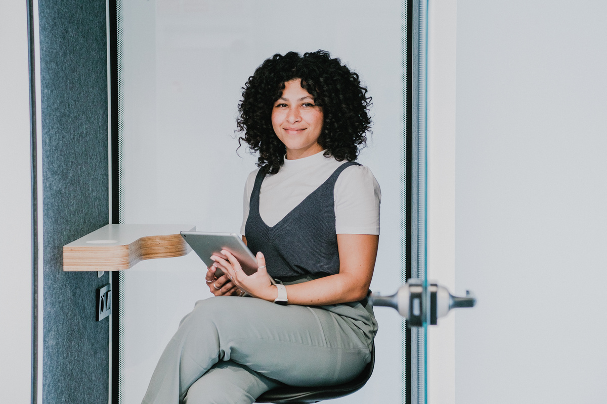 Cool Corporate Woman with a Tablet at an Office