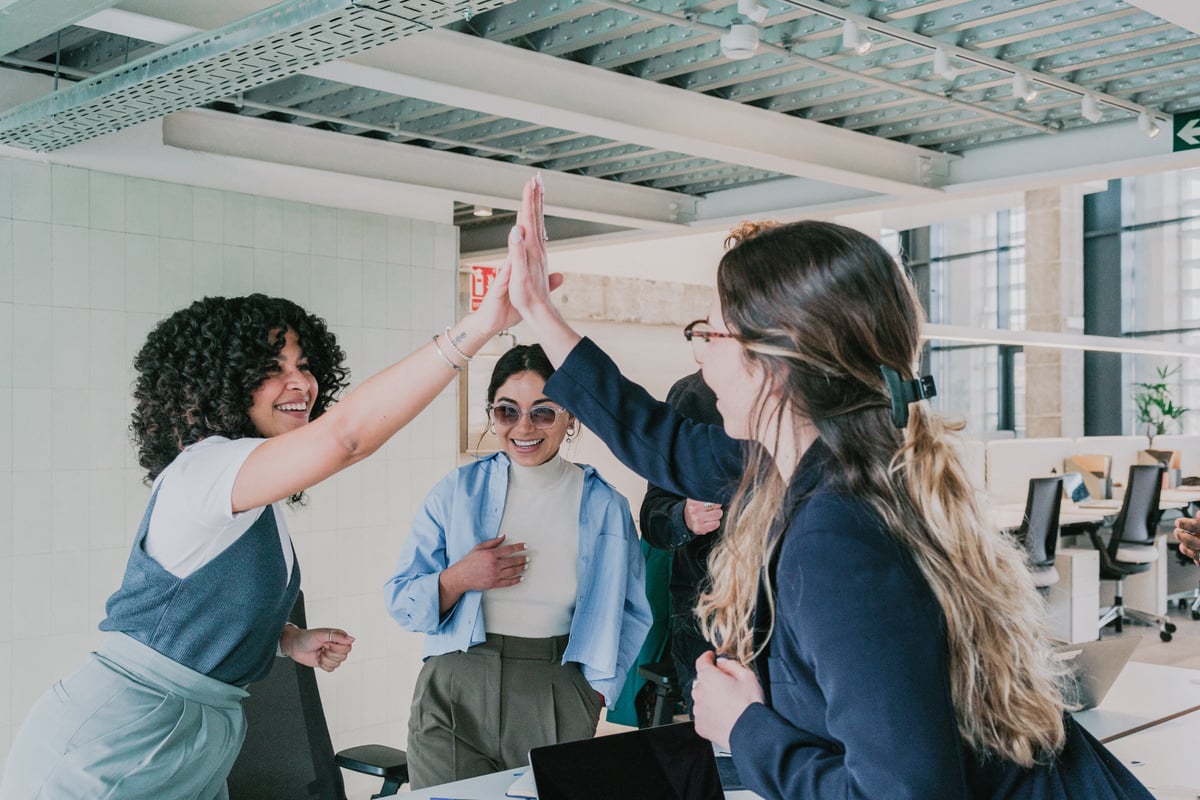 Cool Corporate Team Doing a High Five