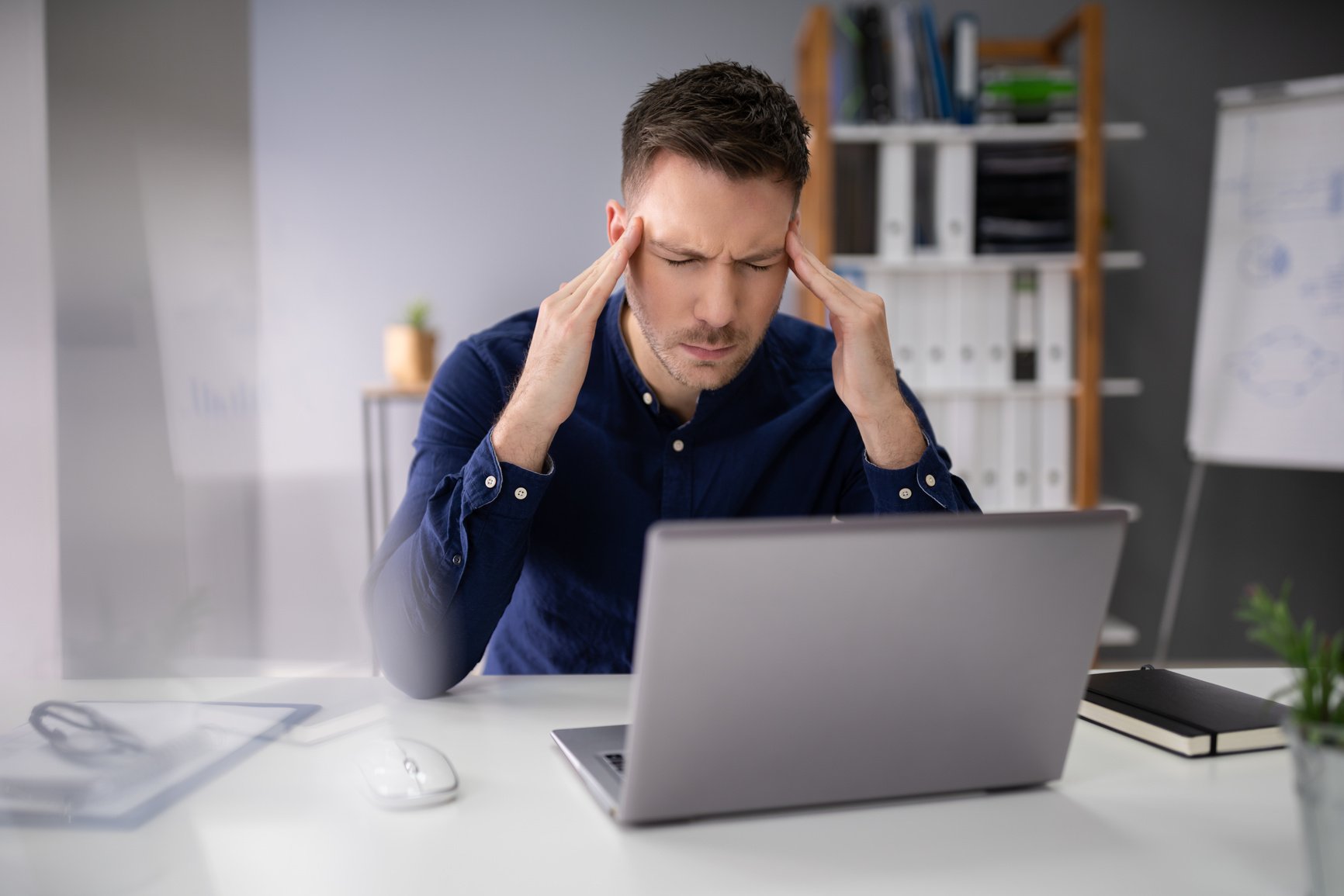 Stressful Business Man Working On Laptop